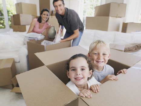 Business move planning with labels, boxes, and office equipment