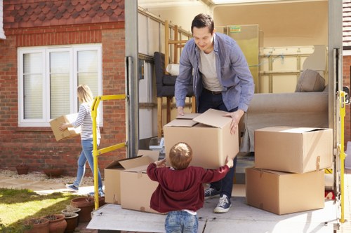 Professional movers handling a flat removal in a Scottish city