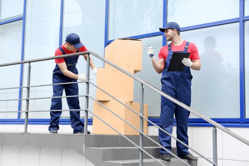 Removal team loading household items for a Scotland moving service