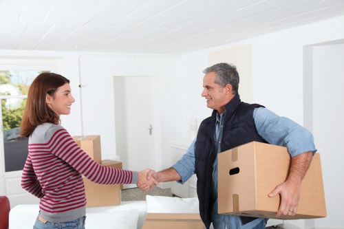 Removal crew loading furniture for a house or office move in Scotland