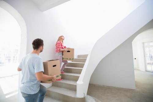Removal team planning a house move in a Scottish city street