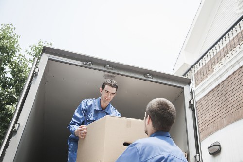 Removal van and team managing access during a house move