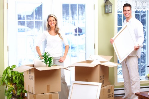 Mover handling fragile items during a professional removals service