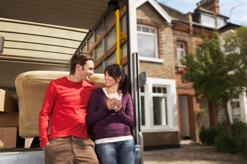 Local moving team navigating narrow Scottish city streets