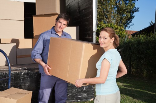 Removal van prepared for a home move near Scottish residential buildings